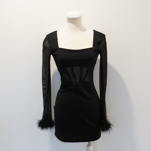 Elegant Black Dress with Sheer Sleeves